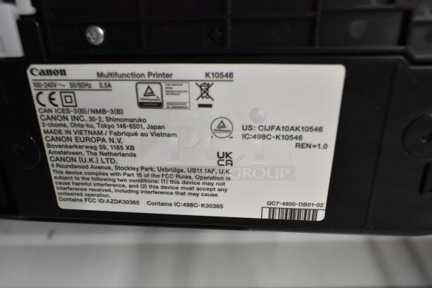 Canon multifunction printer label showing model K10546. Operational voltage: 120 volts, 1 phase. Made in Vietnam.