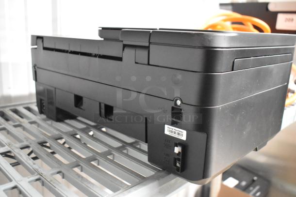 Canon countertop printer scanner copier machine, black, 120 volts, 1 phase. Serial number visible on the side.