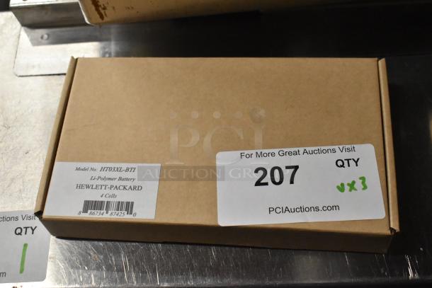 Box containing HT03XL-BTI Li-Polymer Battery; labels show model and quantity x3 for auction lot 207.