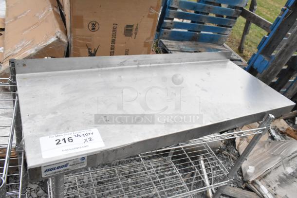 Two chrome finish 3-tier wire shelving units, durable, in used condition. Label shows model EBW8-122048, PCI Auctions.