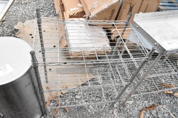 2 chrome finish 3-tier wire shelving units in used condition. Buyer must dismantle. Consider freight charges for shipping.
