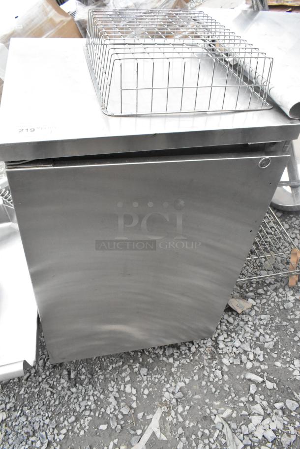 Perlick commercial counter with door, stainless steel finish, includes wire rack on top, in good condition.