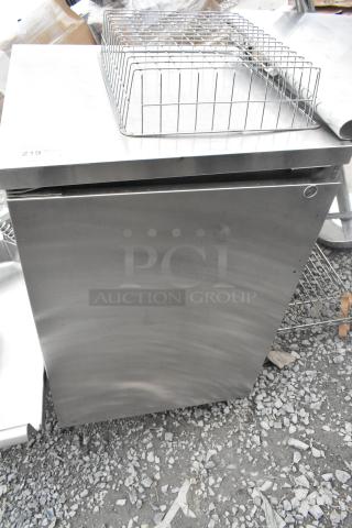 Perlick commercial counter with door, stainless steel finish, includes wire rack on top, in good condition.