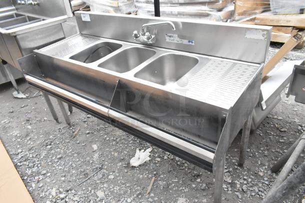 Krowne 3 bay back bar sink with dual drain boards, faucet, and speedwell in stainless steel, good condition.