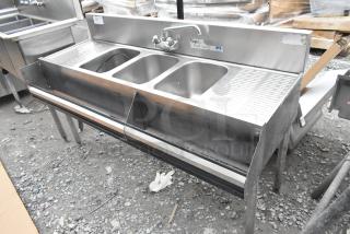 Krowne 3 bay back bar sink with dual drain boards, faucet, and speedwell in stainless steel, good condition.