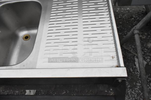 Krowne 3 Bay Back Bar Sink with dual drain boards, featuring faucet and speedwell, stainless steel, used condition.