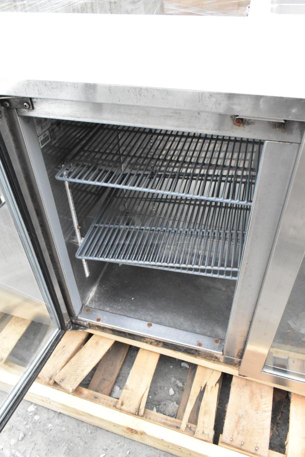 Perlick BS3DS Commercial Back Bar Cooler with 4 doors, including 3 merchandiser glass doors. 115 volts, 1 phase. Used condition.