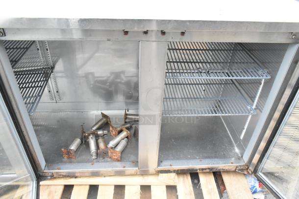 Perlick BS3DS commercial 4-door back bar cooler, stainless interior, visible rust on bottom, comes with shelves and hardware.