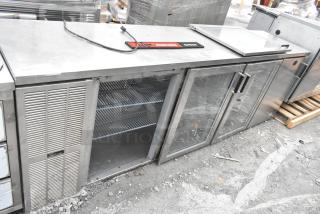 Perlick BS3DS Commercial Back Bar Cooler, 4 doors with 3 merchandiser doors visible, one door detached, runs on 115 volts, 1 phase.