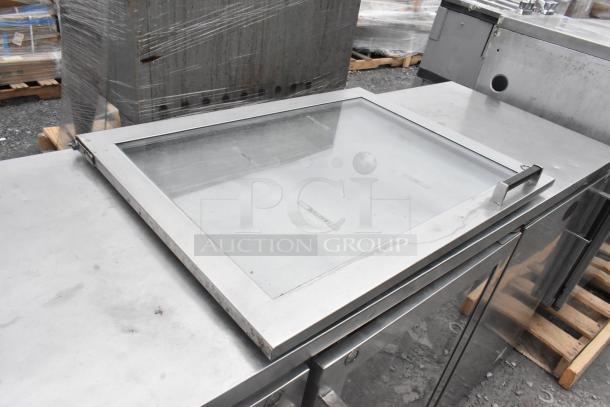 Perlick BS3DS commercial back bar cooler with three attached merchandiser doors and one unattached door, 115 volts, 1 phase.