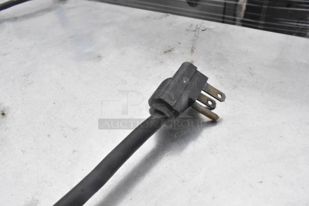 Perlick BS3DS Commercial 4 Door Back Bar Cooler, 115V, 1 Phase. 3 Merchandiser Doors; 1 Door Unattached. Image of Plug.