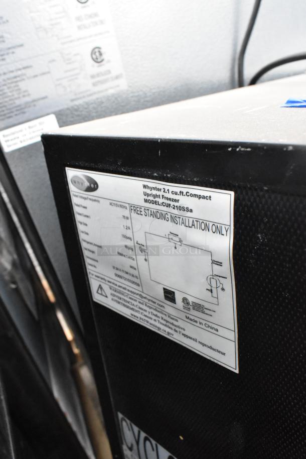 Four mini coolers, including Galanz GLR33MBKE23, Whynter CUF-210SSa, Galanz GL27BK, Haier. 120V, 1-phase. Model tag visible.