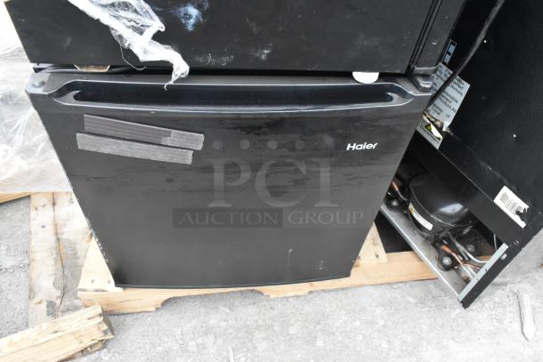 Four mini coolers on a pallet: Galanz GLR33MBKE23, Whynter CUF-210SSa, Galanz GL27BK, Haier. Power: 120V, 1 phase.