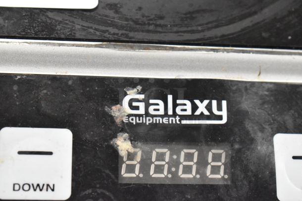 Galaxy 177GICP18 induction range panel with display and buttons visible. Shows wear; 120V, 1 phase, countertop model.
