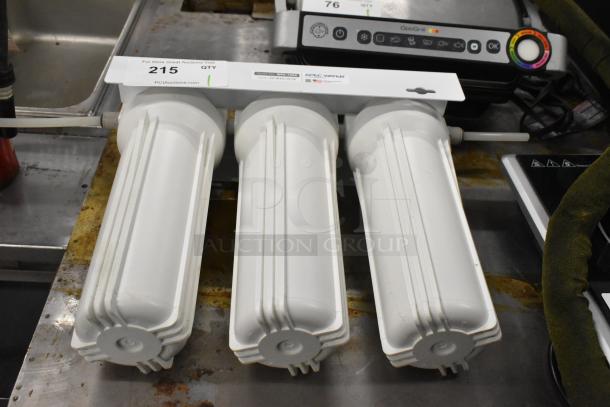 Apec Water WFS-1000 water filtration system with three white canisters, model label visible, in good condition.