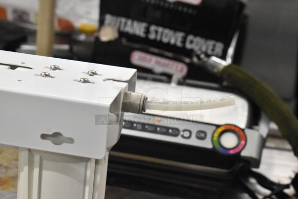 Apec Water WFS-1000 filtration system showing connection part and tubing. Visible screws and slots indicate setup condition.