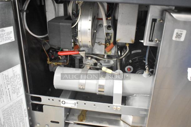 Brand new Frymaster FPPH255CSE propane deep fryer, 80,000 BTU, with 4 metal fry baskets, filtration system, on casters.