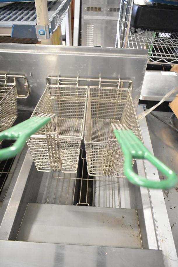 BRAND NEW 2021 Frymaster FPPH255CSE deep fat fryer with 4 metal fry baskets, filtration system, on commercial casters.