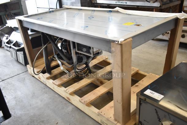 Brand new Hatco FTB-3 commercial 57" three pan drop-in frost top on a wooden pallet. 120 volts, 1 phase, scratch and dent.