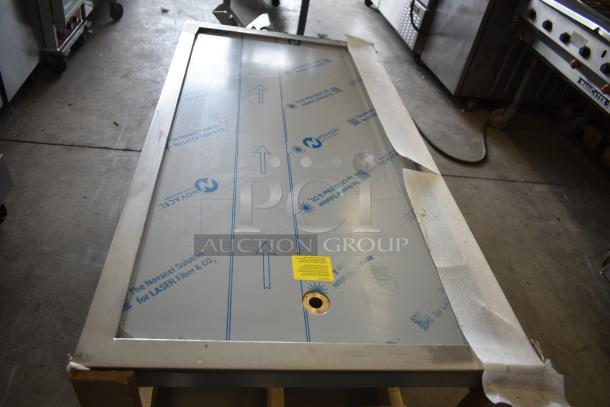 Brand new Hatco FTB-3 frost top, 57" drop-in, accommodates three pans, 120V, 1 phase, with protective film, slight scratches.