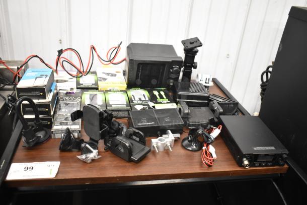 62 assorted items including Uniden Pro505XL radio, Rove & MobileSpec earbuds, micro USB cables; new condition.