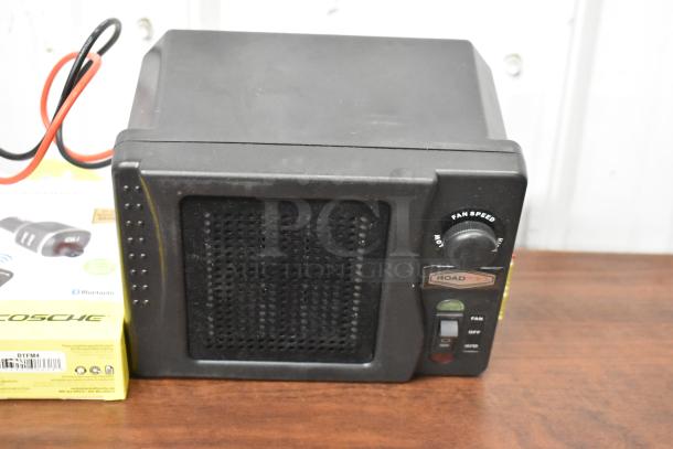 62 assorted items including a Uniden Pro505XL radio and various earbud brands. Visible: RoadPro device, good condition.