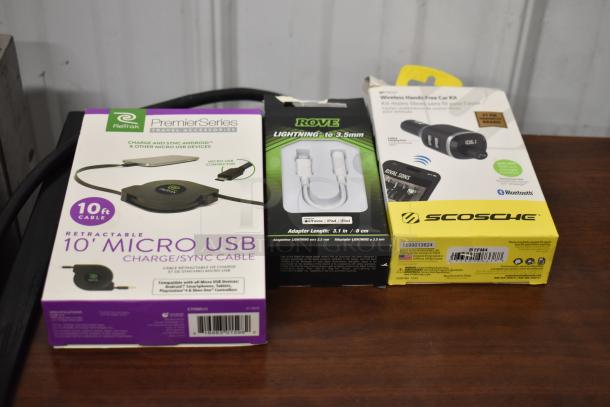 62 various tech items including Uniden Pro505XL radio, Rove wired earbuds, MobileSpec buds, PremierSeries Micro USB cable.