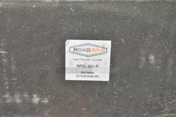 RoadPro RPSL-681-P label on a black surface, indicating 300 watts, 12-13.8 volts DC.