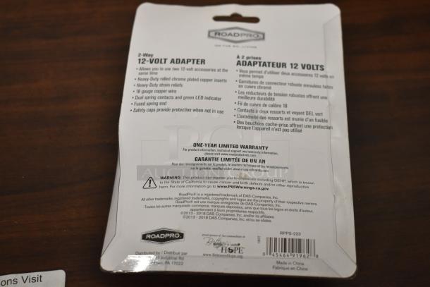 Back of RoadPro 12-Volt Adapter package showing product features, safety warnings, and one-year limited warranty details.