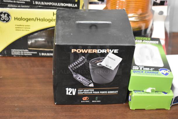 Boxed PowerDrive 12V Cup Adapter with USB and DC ports. Marked price $21.99. Includes label PD9022USB.