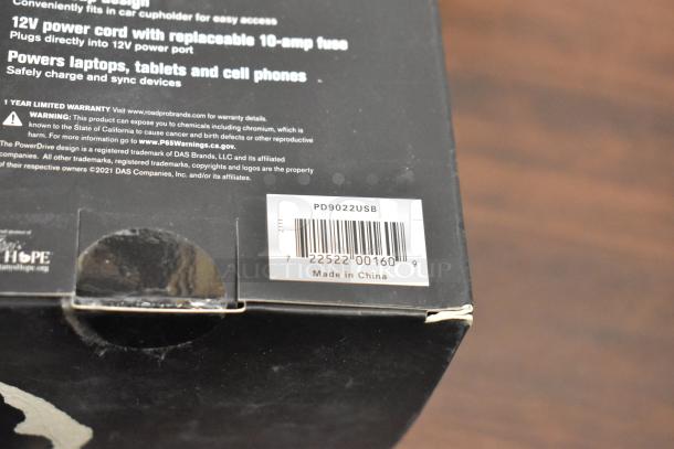 Box showing 25-item set including PowerDrive Cup Adapter. Mentions 12V power cord, warranty, and "Made in China" label.