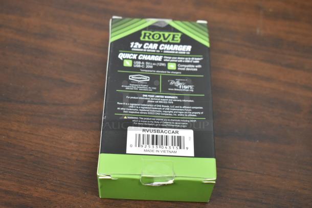Rove 12V Car Charger in packaging, quick charge label, warranty info, and barcode RVUSBACCAR, made in Vietnam.