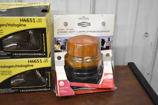 25-item lot featuring RoadPro strobe light with magnetic mount and GE halogen headlamp, model H4651. New in packaging.