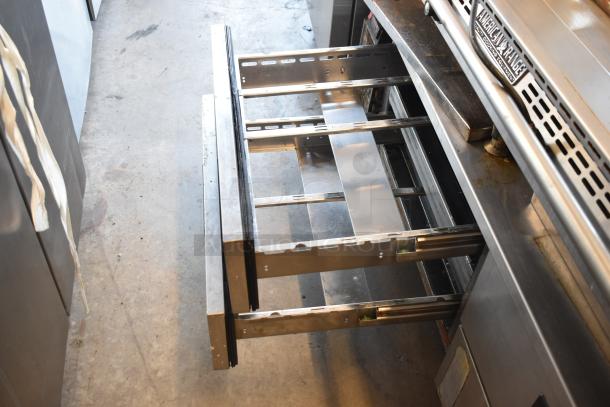 American Range commercial countertop flat top griddle with open commercial 4 drawer chef base, stainless steel finish.