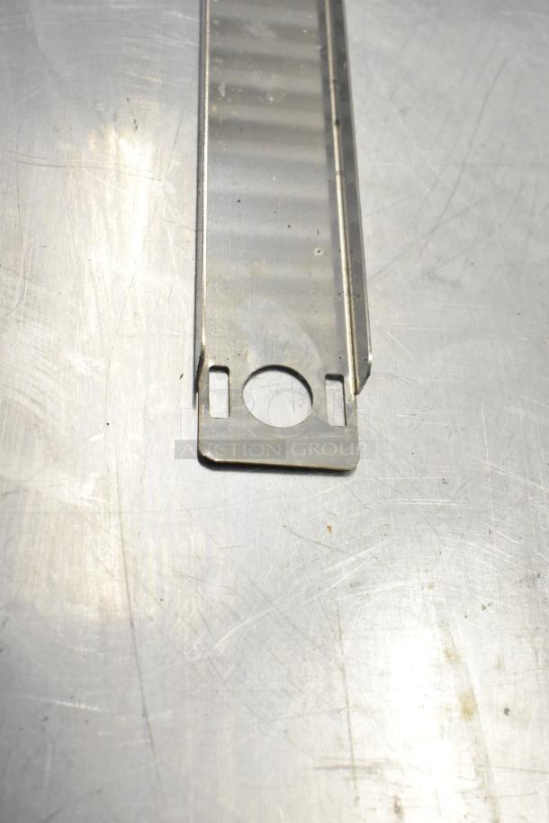 20 brand new Cadco/Unox items, including ballasts and blower wheel, shown is a metal component with a circular cutout.