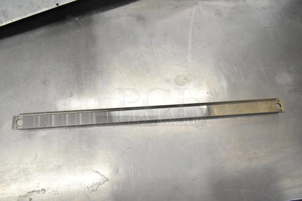 20 brand new Cadco/Unox items, including ballasts and blower wheel, on metal surface.