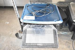 2024 Hobart HTi-7LH4W commercial countertop scale, blue top, cords visible, tested but not powering on.