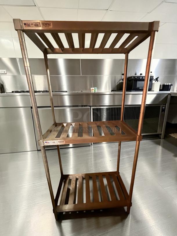 Superior condition three-tier commercial keg storage rack by Commercial Beverage Equipment. Durable steel, model KEG-S-RACK-0656.