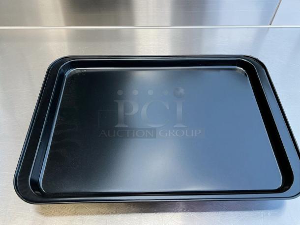 Pristine non-stick commercial baking sheet pan by Commercial Kitchen Equipment. Heavy duty, professional bakeware, model BAK-S-PAN-0664. Quantity: 7.