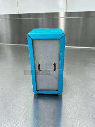Retro metal napkin dispenser in blue, Commercial Restaurant Equipment model, tabletop style, in remarkable condition.