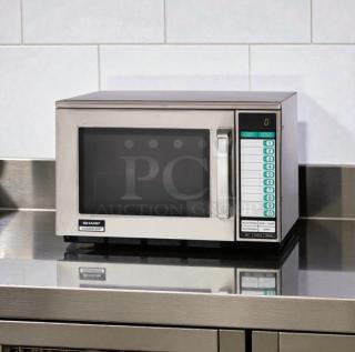 Sharp R-22GT commercial microwave oven, 1200W, stainless steel, excellent condition, model R-22GT, fully operational.