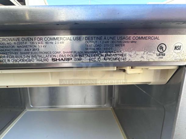 Sharp R-22GT commercial microwave oven, 1200W, stainless steel, superior condition, fully tested, July 2013, serial no. 035101.