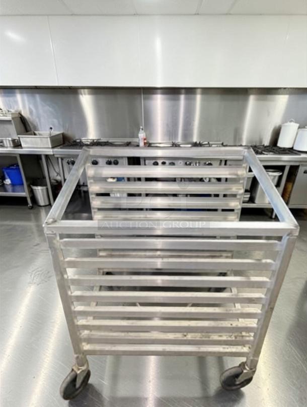 Outstanding condition commercial aluminum sheet pan rack cart with 10 tiers, heavy-duty wheels, and full operational capacity.