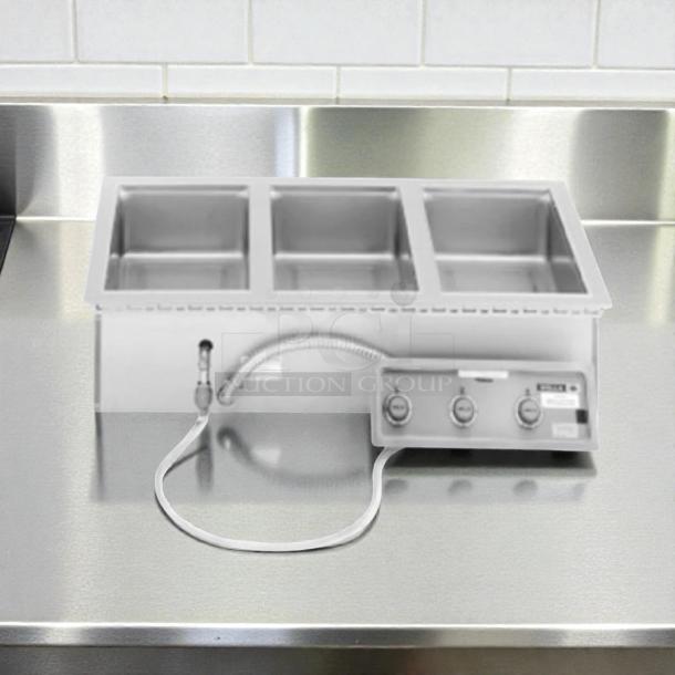 Wells MOD-327TD 3-well electric food warmer, 43" stainless steel, top-mount, fully tested, excellent condition, USA made.