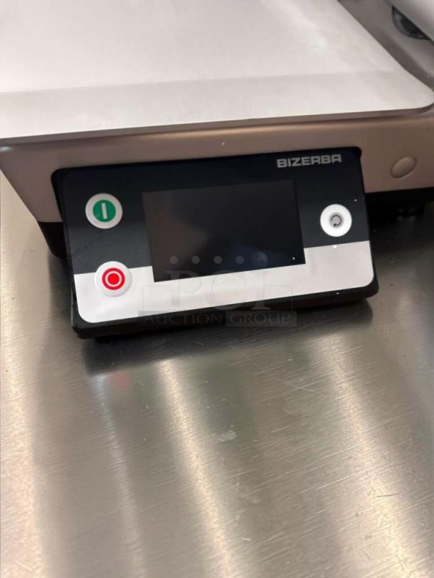 Bizerba GSP HD W-90 deli slicer in outstanding condition, featuring a 13-inch blade and integrated portion scale, fully operational.