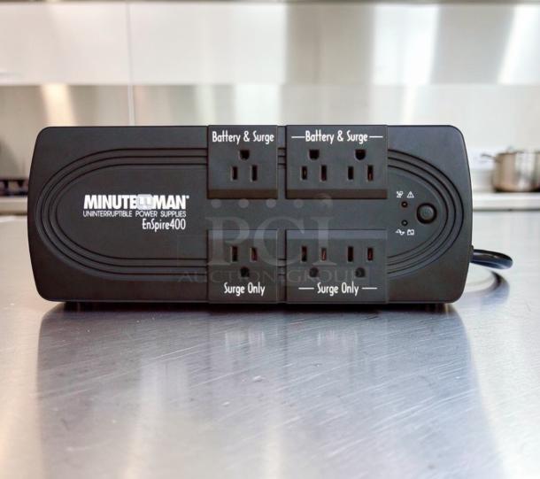Minuteman EnSpire 400 UPS Battery Backup, 6 outlets, excellent condition. Labels: 2 Battery & Surge, 4 Surge Only.