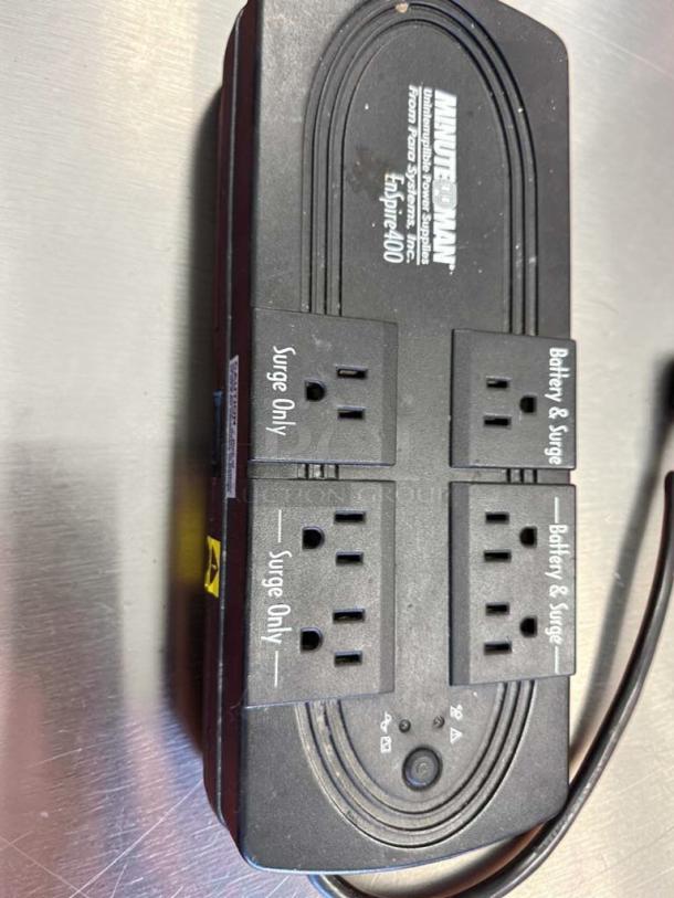 Minuteman EnSpire 400 UPS, 6 outlets, battery backup/surge protection, model UPS-S-MINUTE-0689, high-quality condition.
