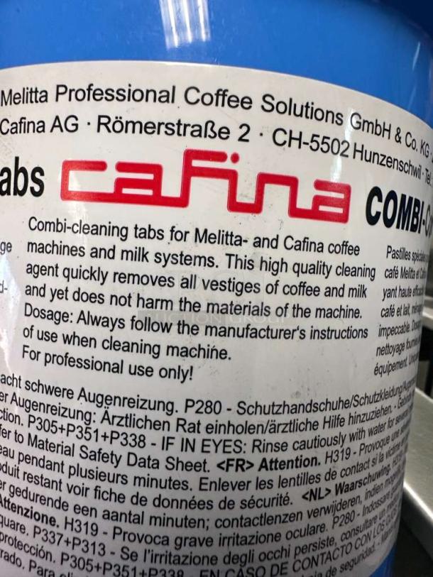Melitta Cafina COMBI-Tabs cleaning tablets label, detailing use for Melitta & Cafina machines. Instructions and safety text visible.
