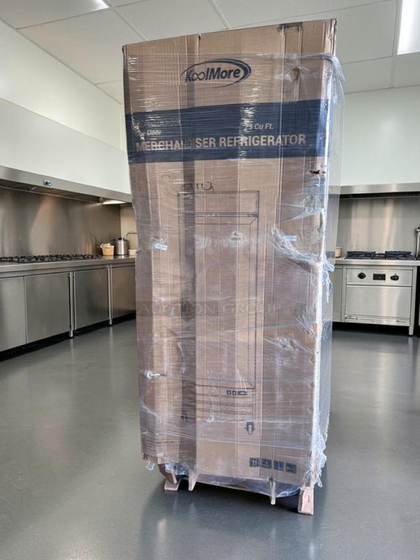 Brand new KoolMore MDR-1GD-23C 1-door commercial glass display refrigerator in packaging, features LED lighting.