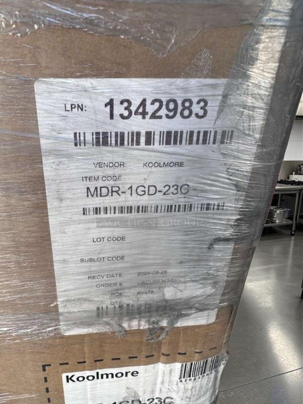 KoolMore MDR-1GD-23C 1-Door Glass Display Refrigerator in original packaging, brand new condition. Model and vendor labels visible.